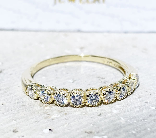 This stylish quartz half eternity ring is beautifully displayed, the fine craftsmanship shows off the row of clear quartz, and their stunning sparkle. It's a beautiful gift ring for anybody who loves gemstones.