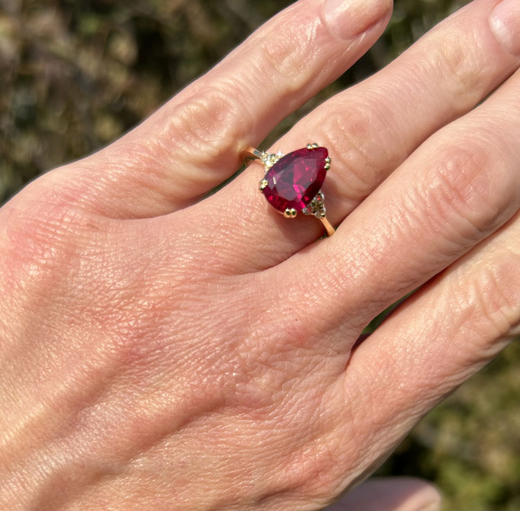 An absolute stunner, classic ruby engagement ring with a pear cut gemstone of your choice as it’s centre stone and with round cut clear quartz on the band to further accentuate it.