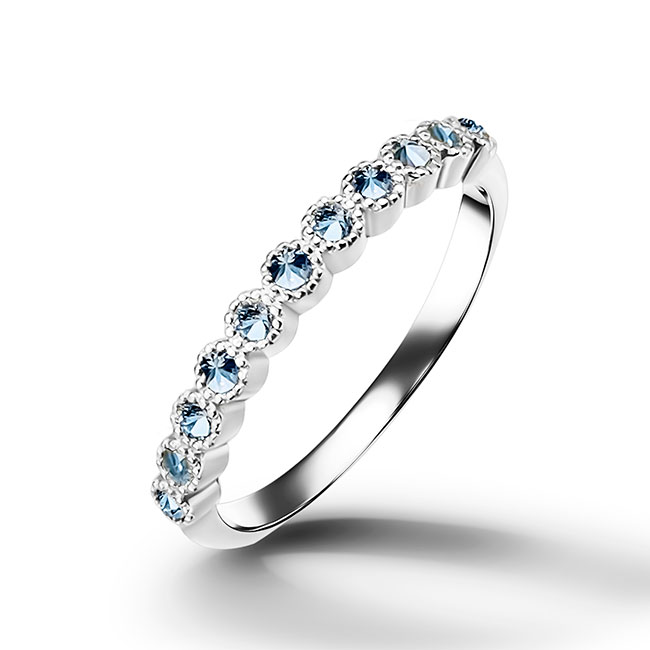 This stylish aquamarine half eternity ring is beautifully displayed, the fine craftsmanship shows off the row of aquamarine gemstones and their stunning sparkle. It's a beautiful gift ring for anybody who loves gemstones.