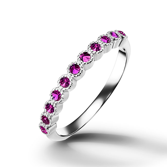 This stylish ruby half eternity ring is beautifully displayed, the fine craftsmanship shows off the row of rubies and their stunning sparkle. It's a beautiful gift ring for anybody who loves gemstones.